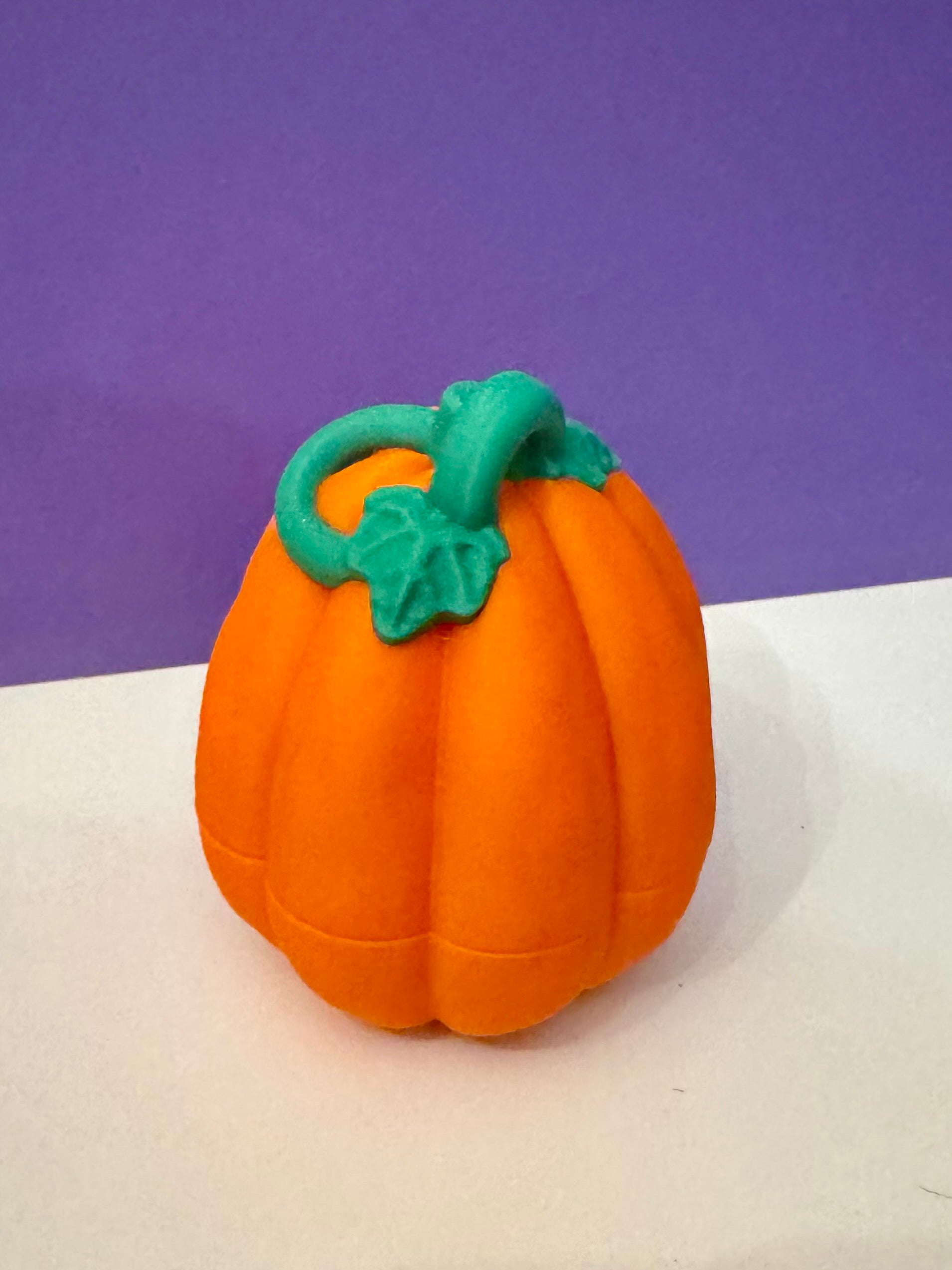 Spooky Halloween Pack 3D Printed Pumpkin Surprise with Flexi Creatures bright orange pumpkin with green stem.